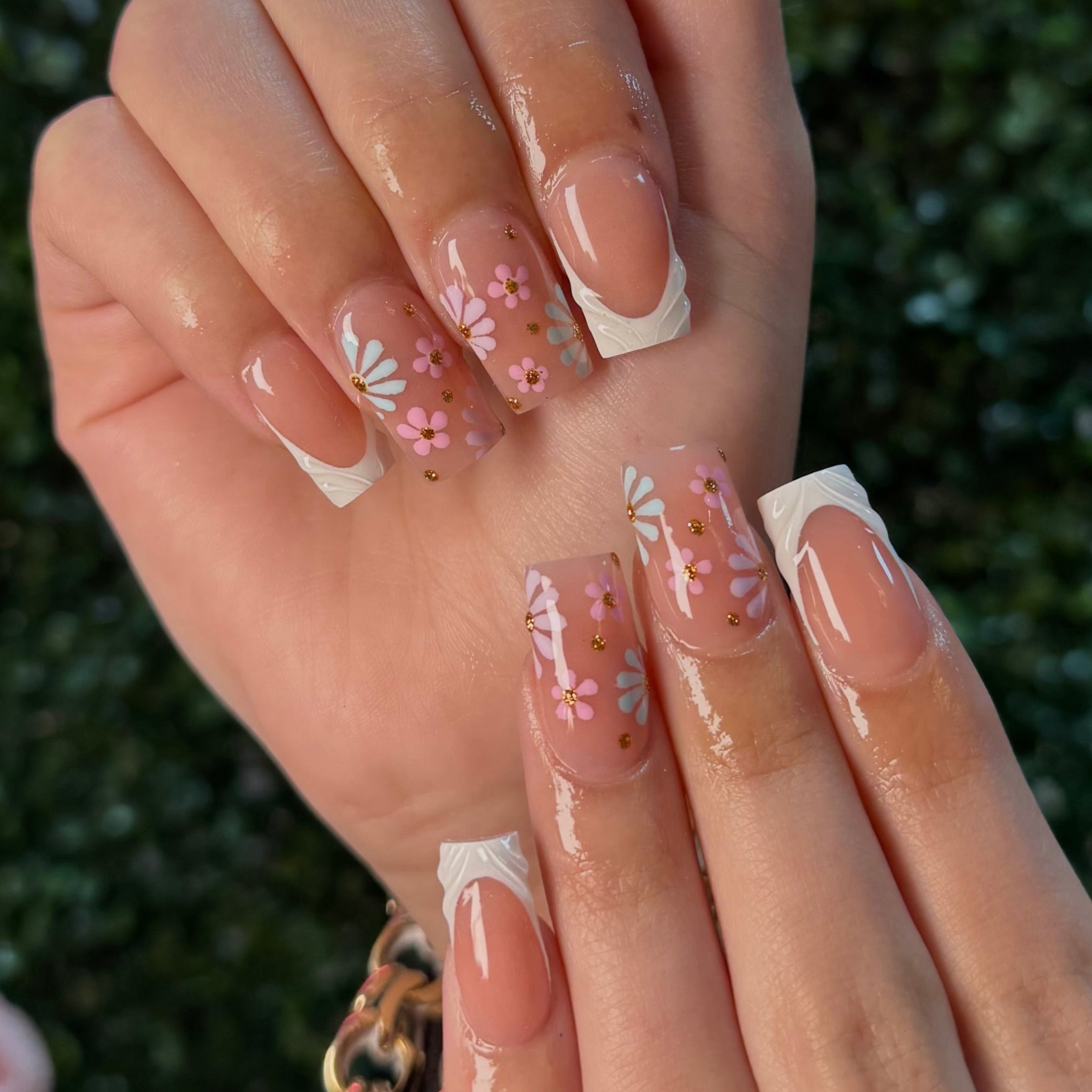 Spring french tip nails with flowers